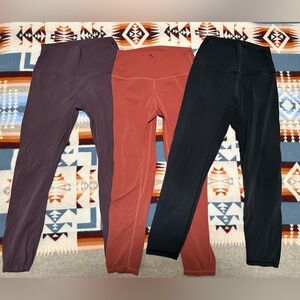 lot of THREE born primative “your go-to leggings”